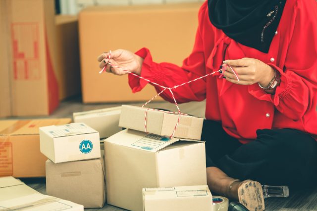 women doing packaging boxes
